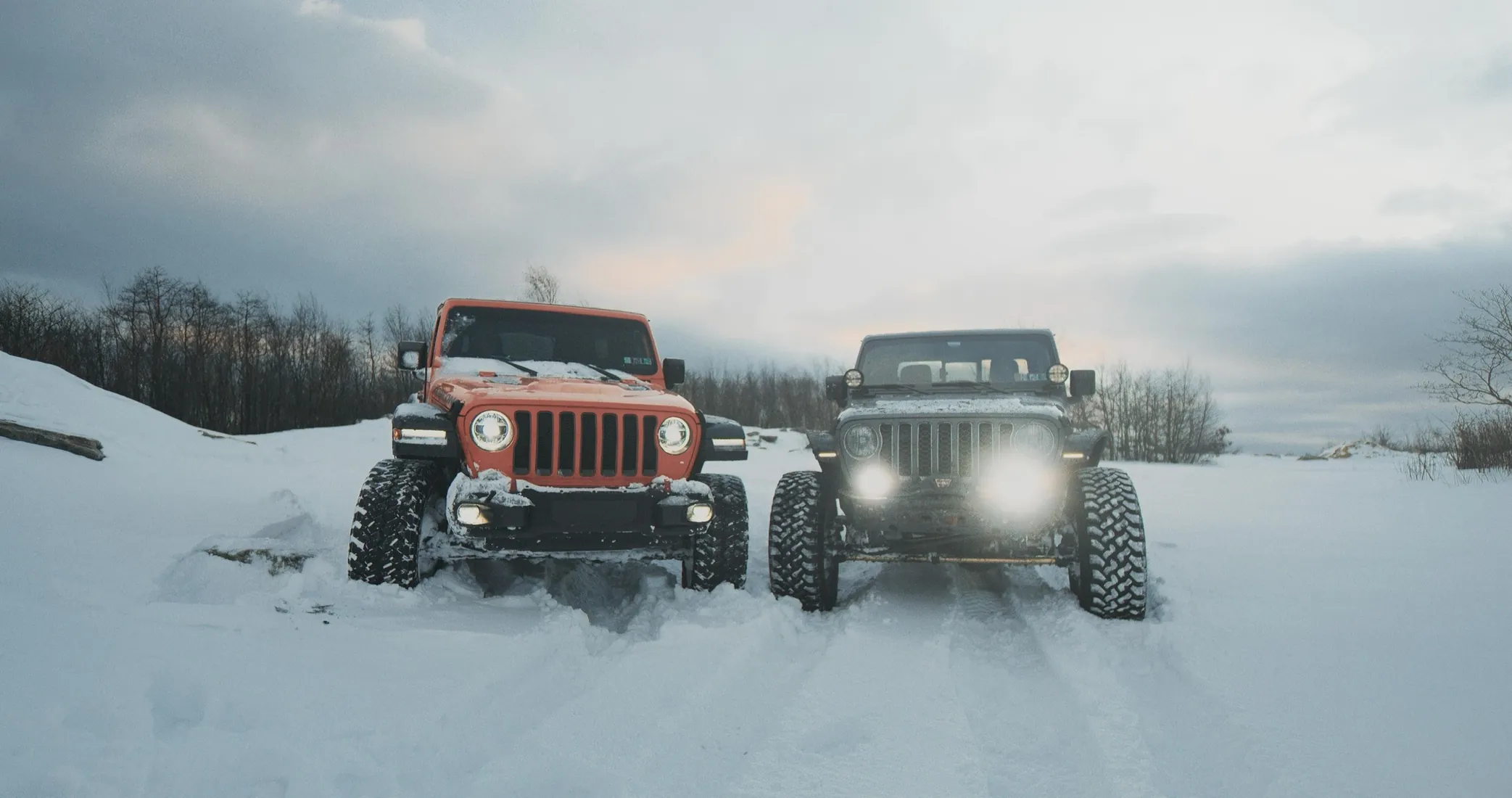 Two Jeeps in the snow on a winter shoot.