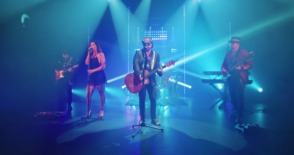 Music video still filmed at WRECK’D Productions in Tinton Falls, NJ: the country cover band Austin City Nights playing under blue stage light