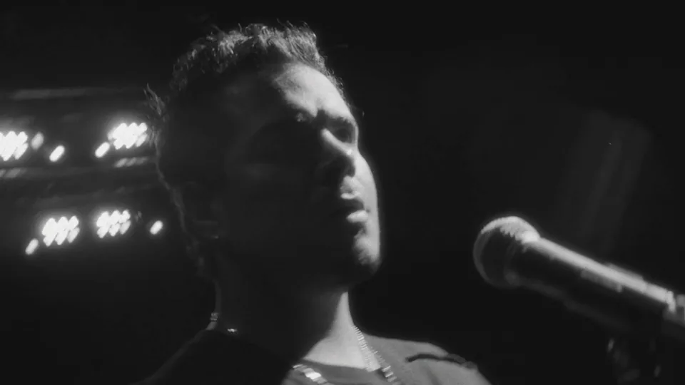 Still from the “Black Is Light” music video by EMBASSYROWE