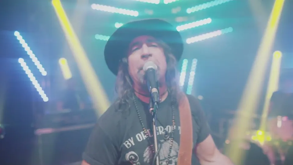 Still from the “Born to Loose” music video